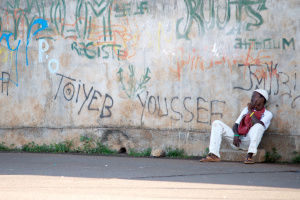 Muslim boy against graffiti